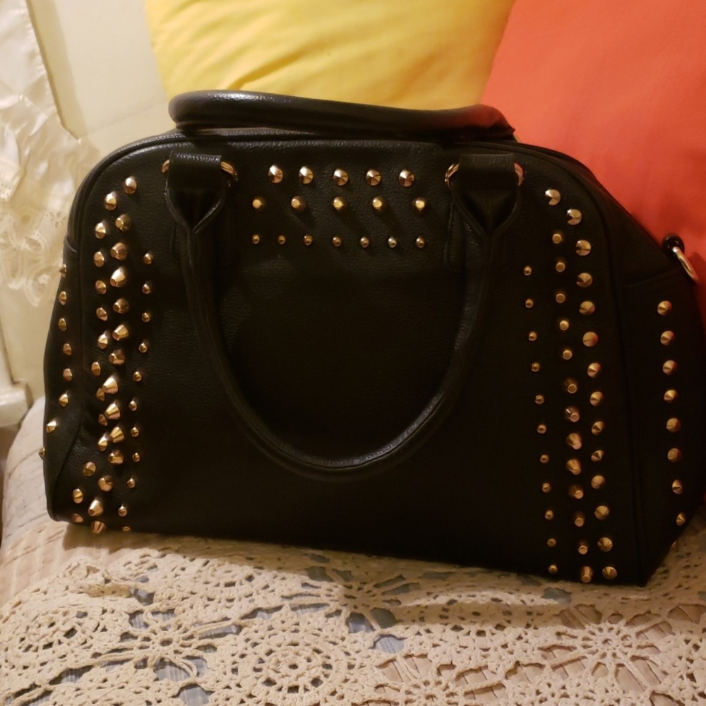 Black leather purse with gold studs
